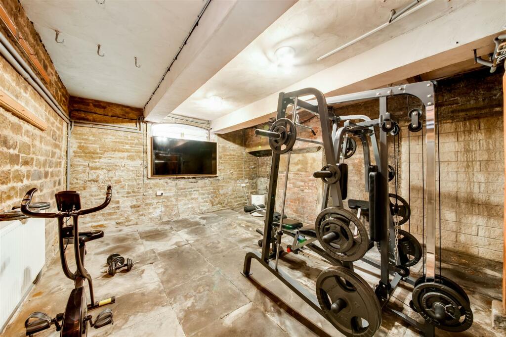 CELLAR ROOM/FORMER KITCHEN/GYM AND FITNESS ROOM