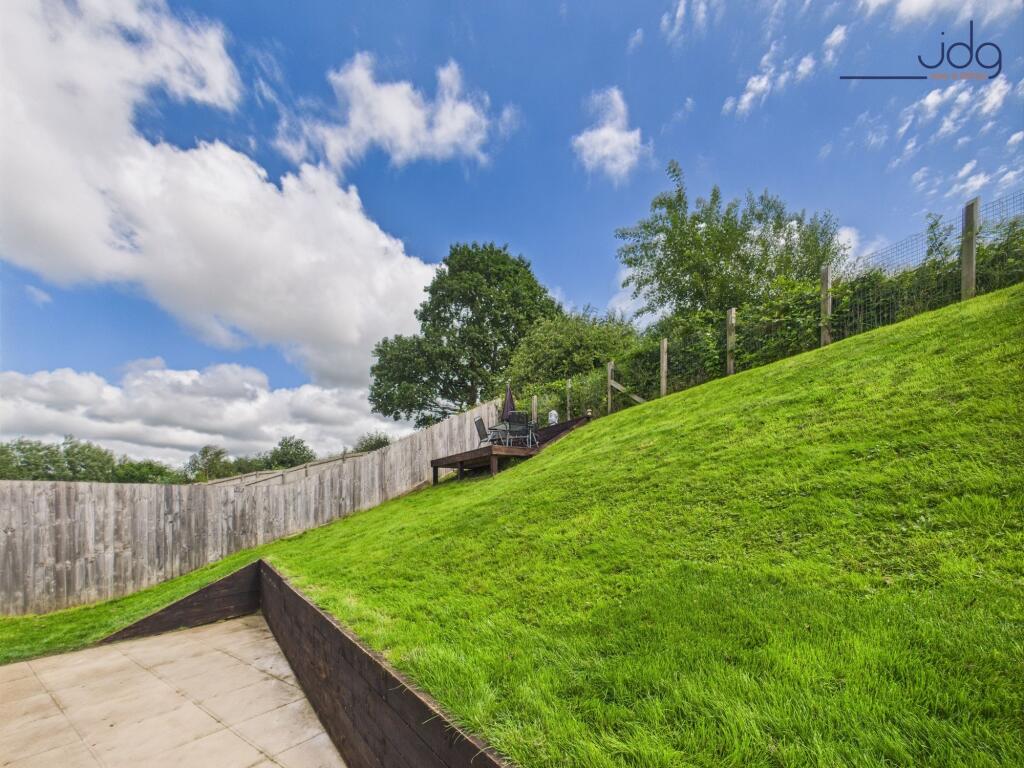 Decked area with sunset views