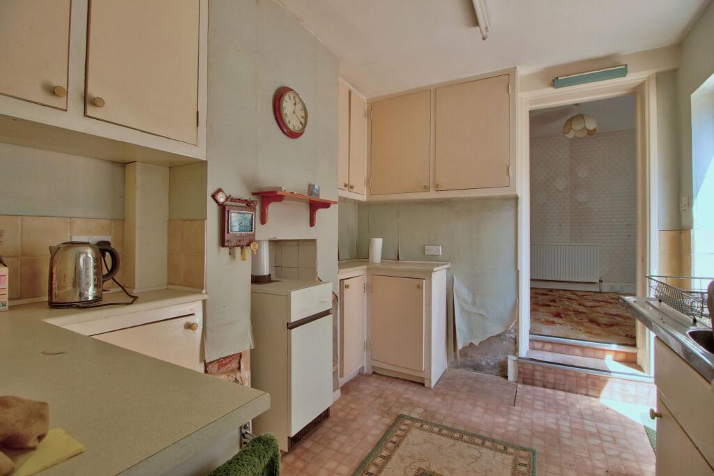 Kitchen with side entrance