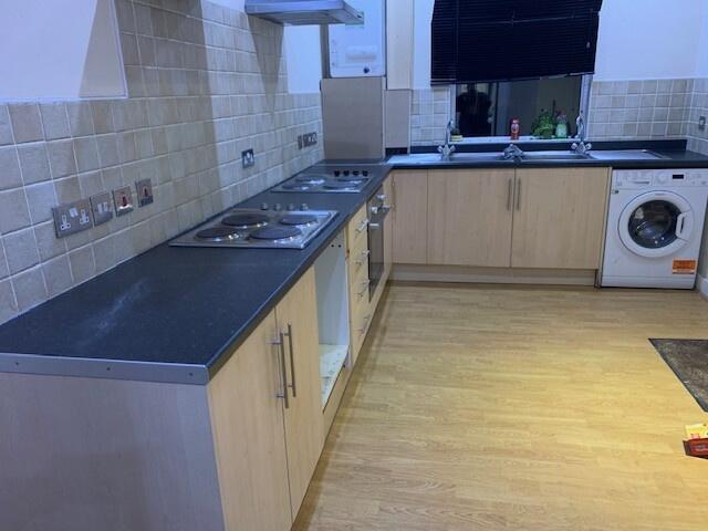 A bright and well-maintained kitchen featuring ...