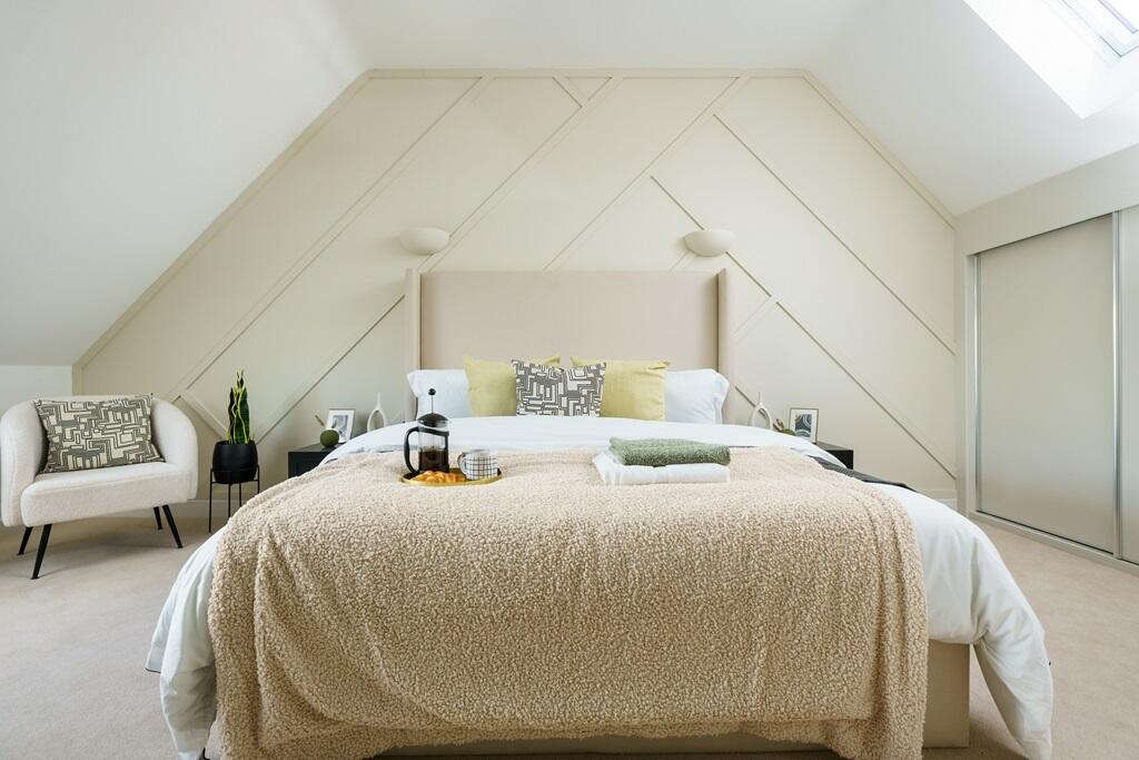 The luxurious main bedroom &amp; en suite is located on the top floor