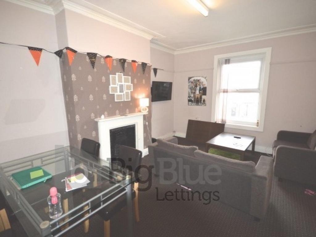 A cozy living room featuring comfortable seatin...