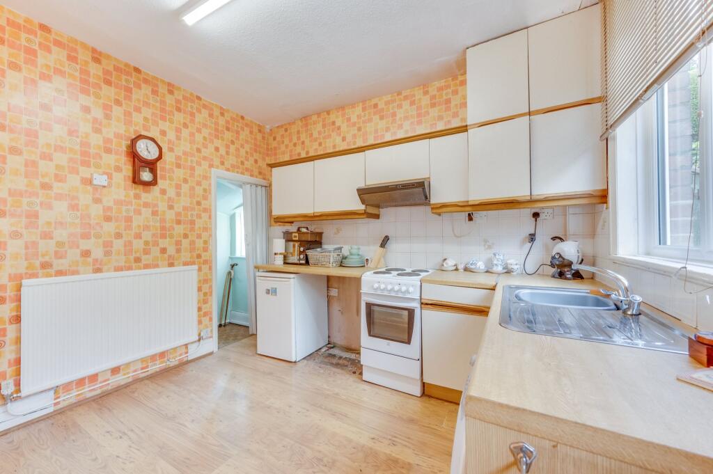 BREAKFAST KITCHEN AND THROUGH SITTING DINING ROOM