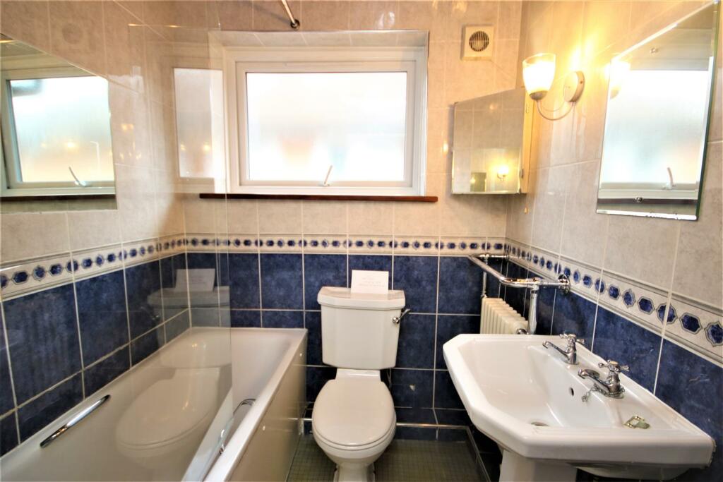 FULLY TILED BATHROOM: