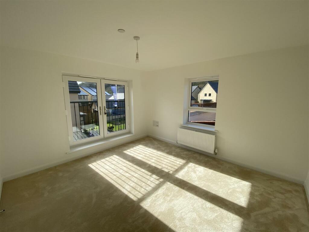 Bedroom 4 / Living Room - 1st Floor
