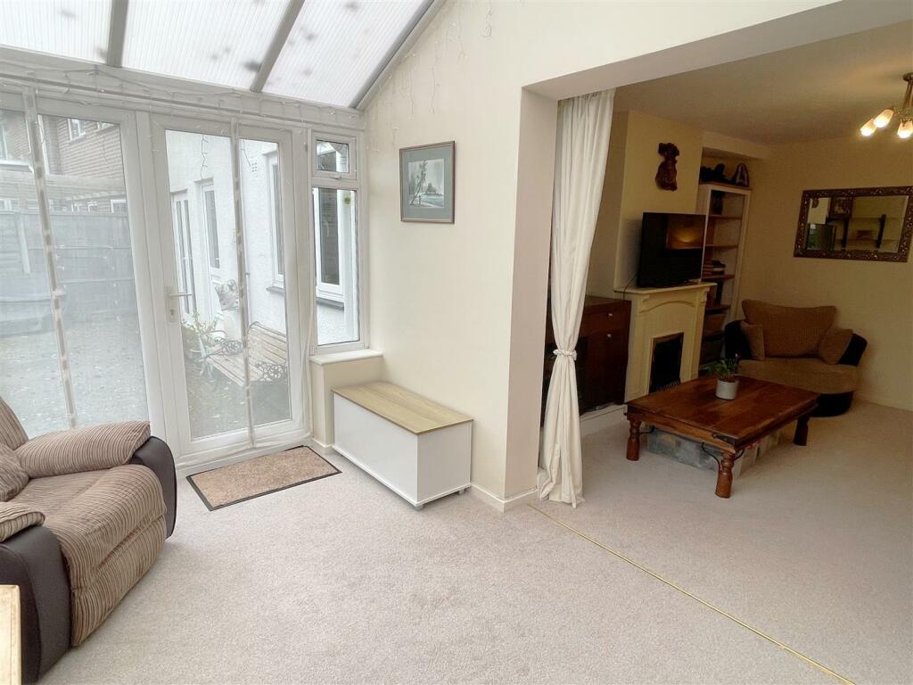 Fam Room - Conservatory 2.JPG