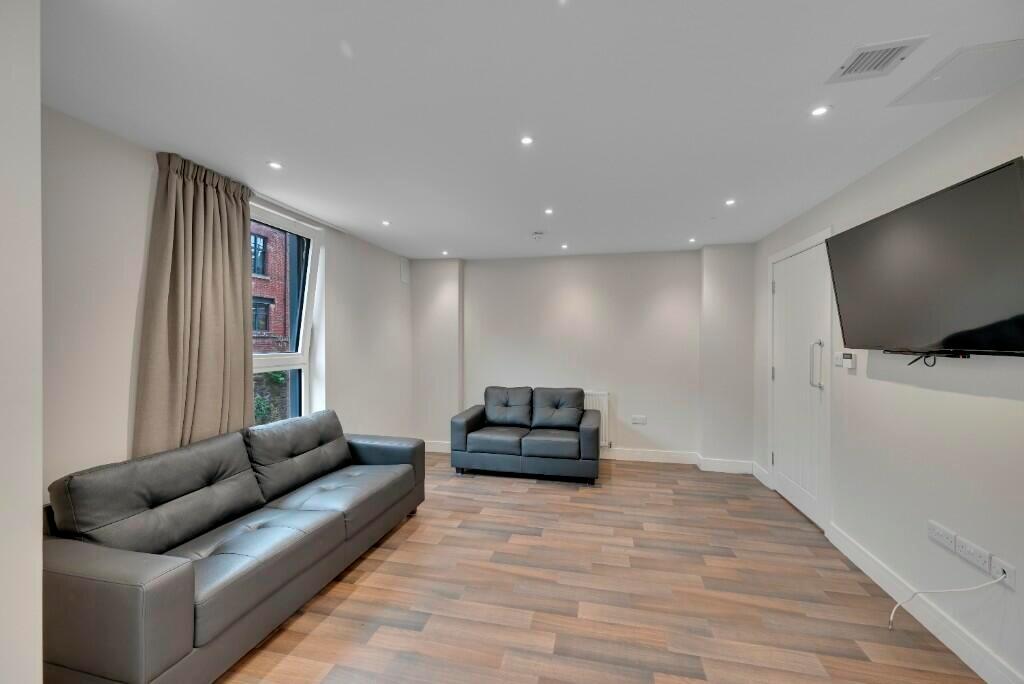 A modern living room featuring two comfortable ...