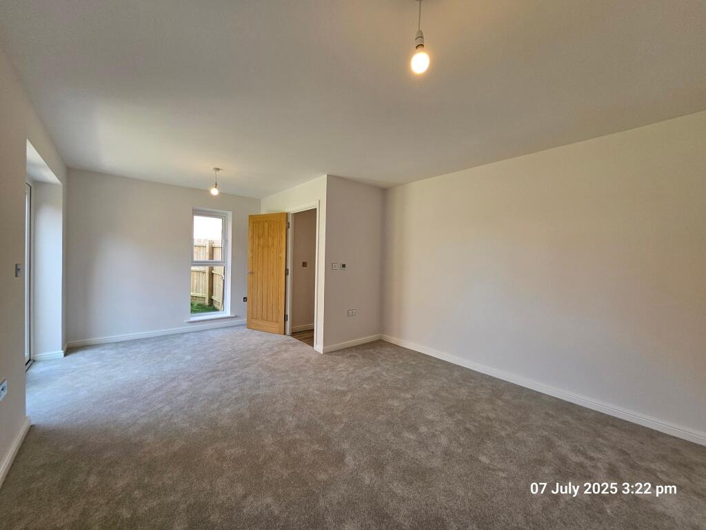 Lounge area leading to rear garden
