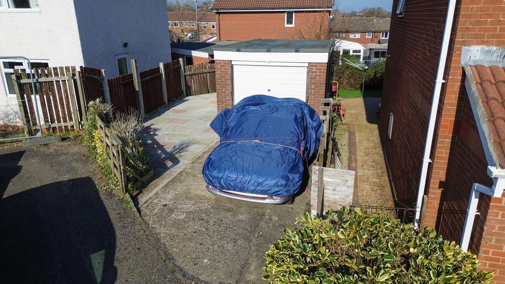Garage And Extra Paved Area