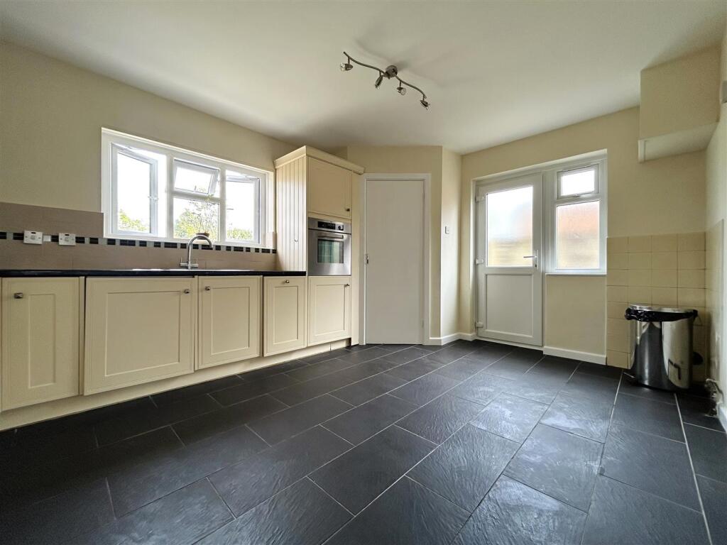 ALTERNATE VIEW OF KITCHEN