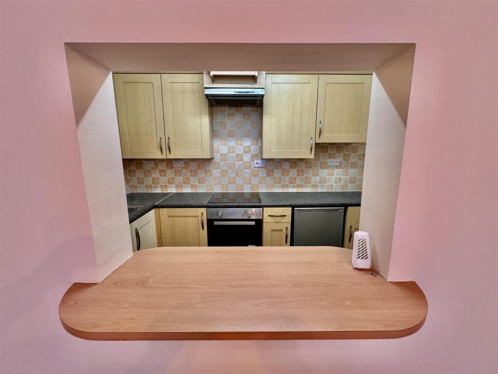 From lounge into kitchen