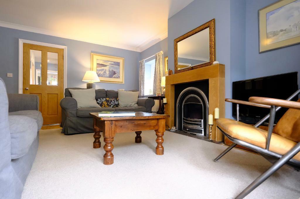Sitting room with electric fire