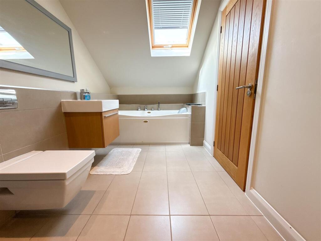 FAMILY BATH AND SHOWER ROOM