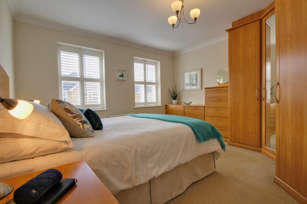 Bedroom with fitted furniture