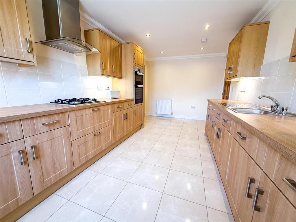 ALTERNATE VIEW OF KITCHEN