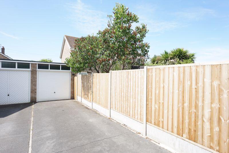 Drive and large single garage