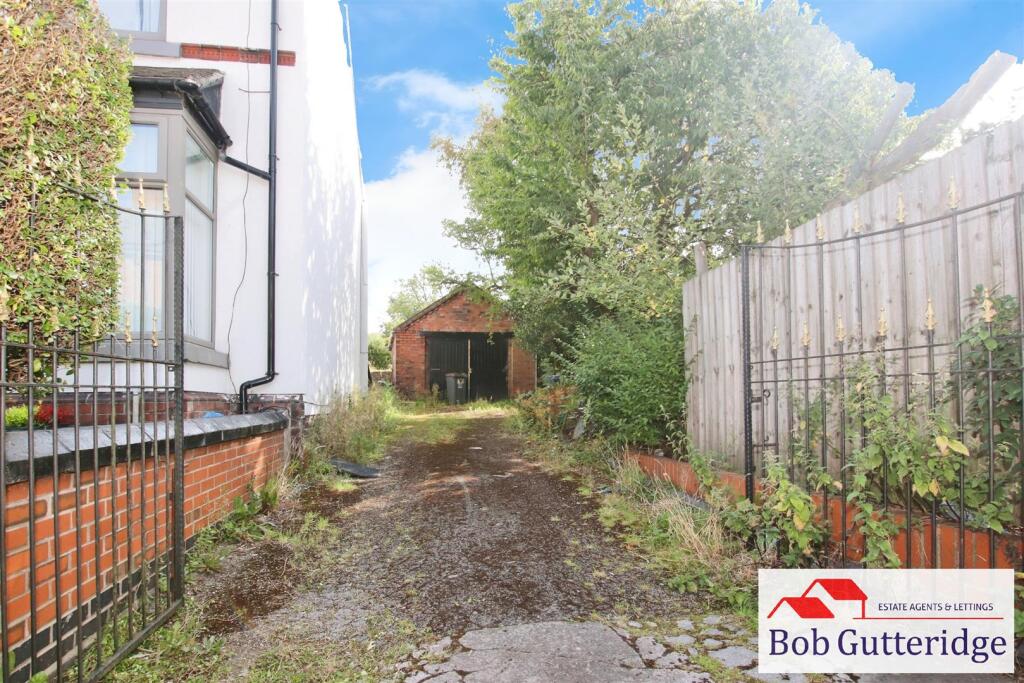 OFF ROAD PARKING &amp; DETACHED BRICK GARAGE