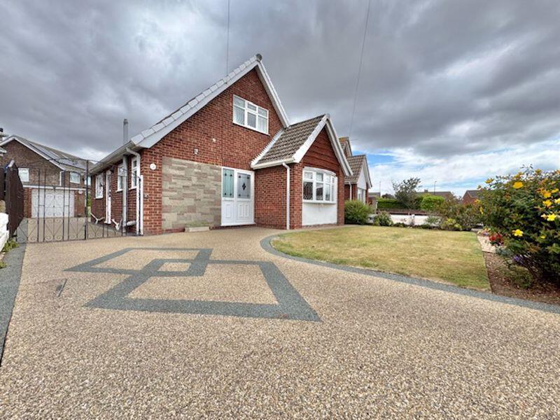 Front garden and driveway view 2