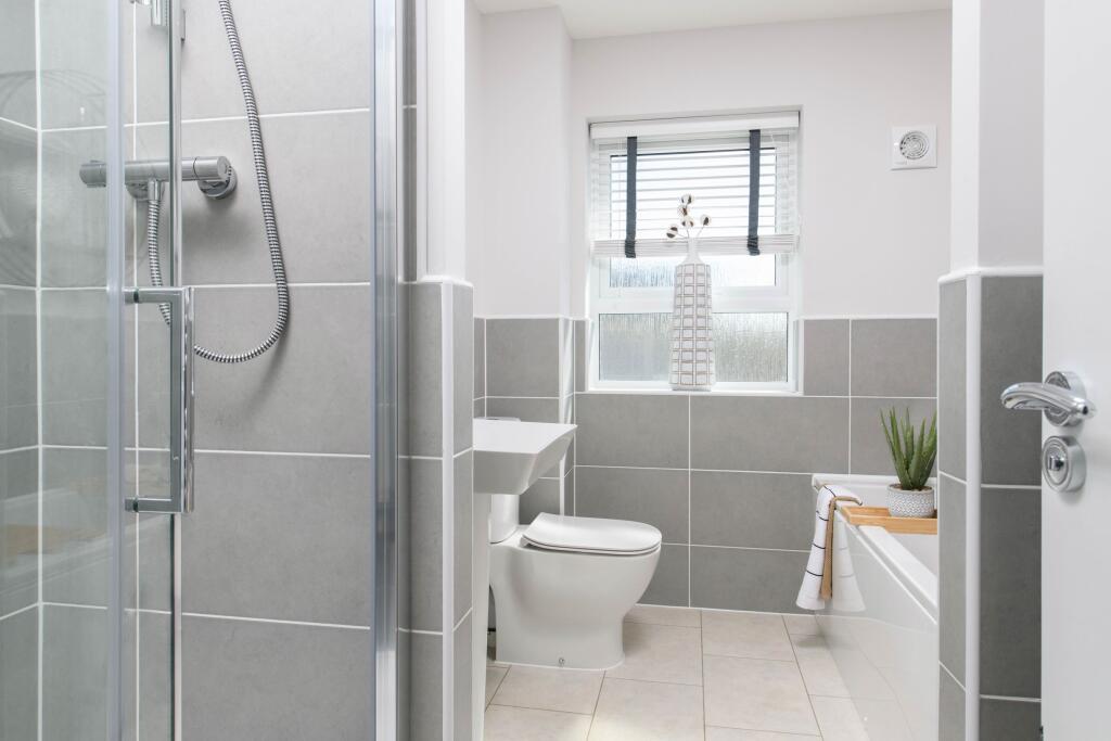 Family bathroom with separate shower, bath, basin &amp; toilet in Millford style home