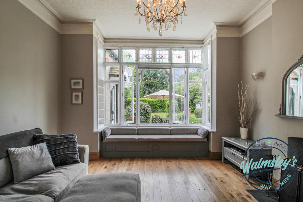 View over gardens through original windows
