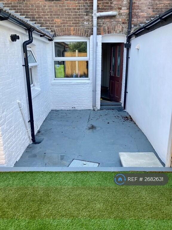 Courtyard To Garden