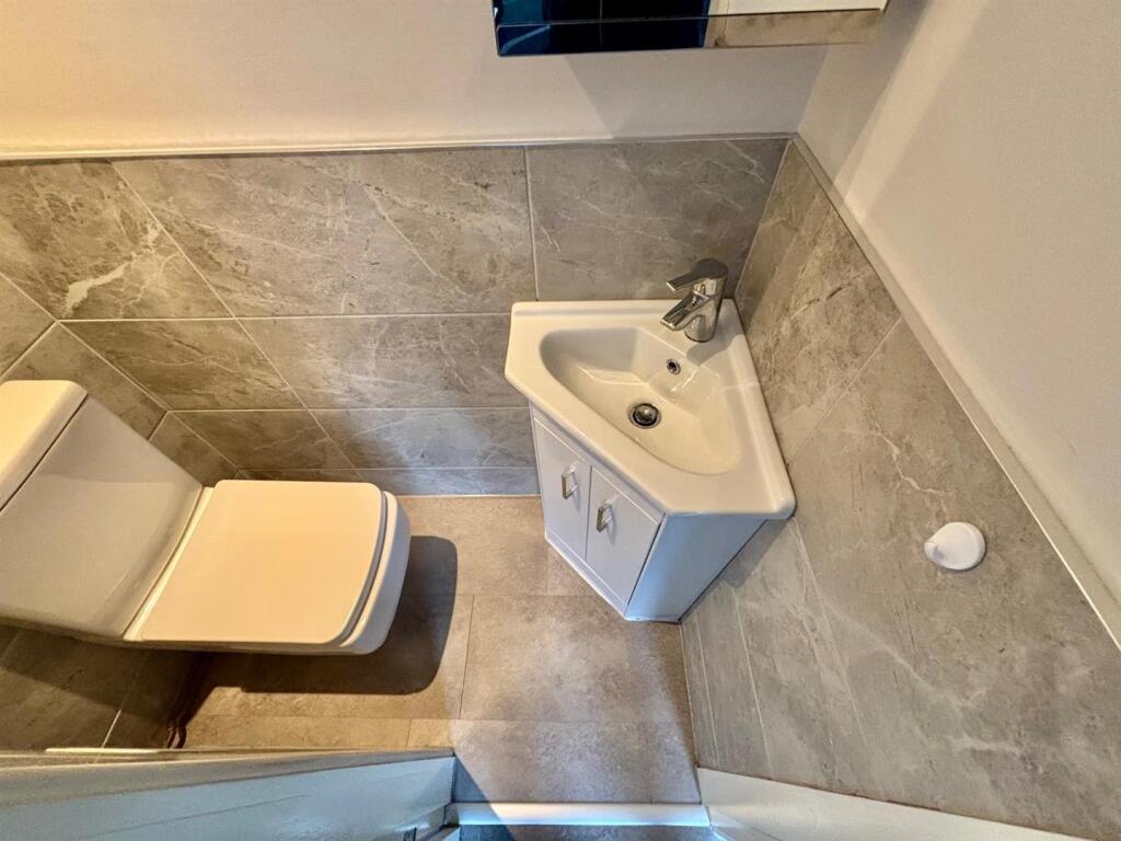 Downstairs Cloak Room / WC: