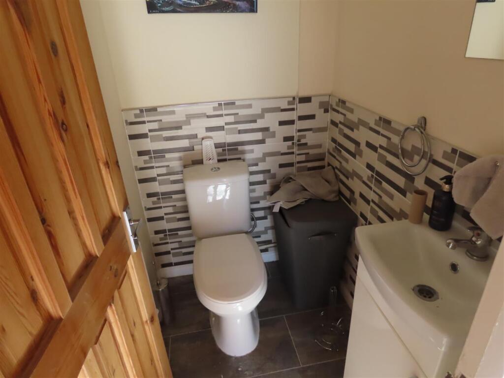 DOWNSTAIRS WC/CLOAKS