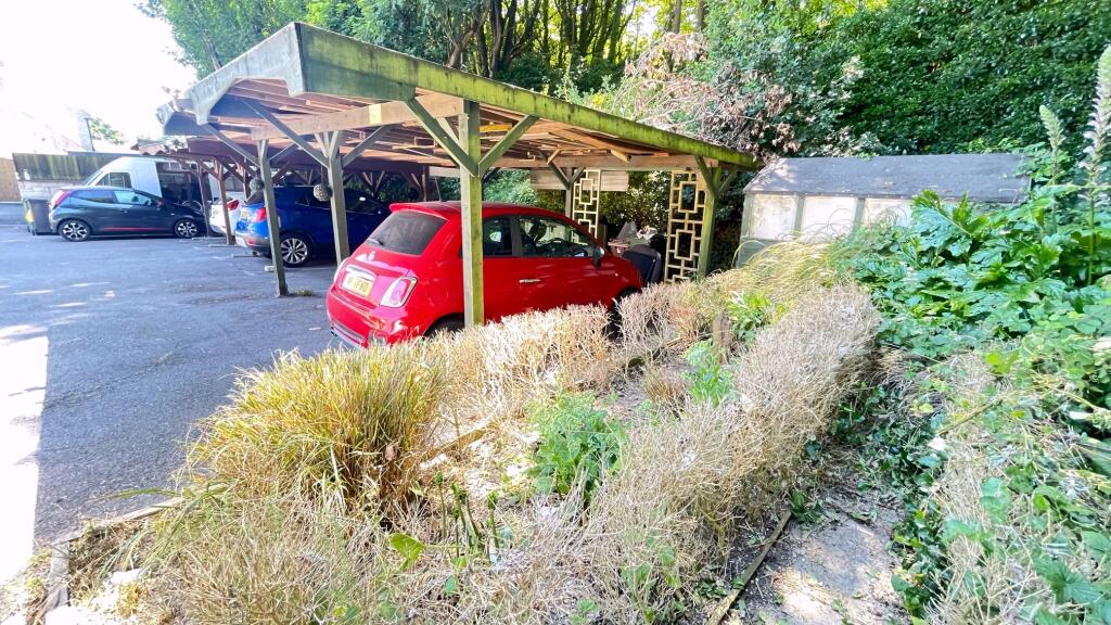 Side garden, shed and car port