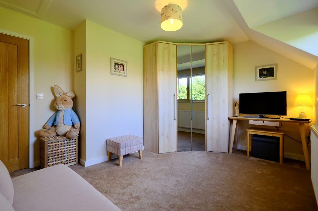 Bedroom 3 with garden views