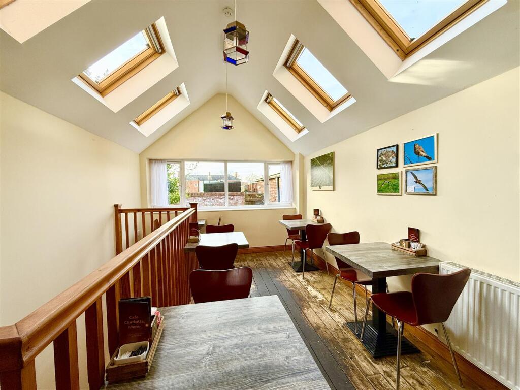 ground floor commercial area to rear