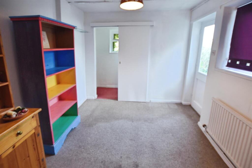 Palyroom/Bedroom Four