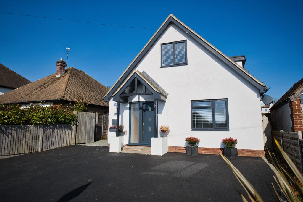 Outside View Of The Property With Driveway Parking