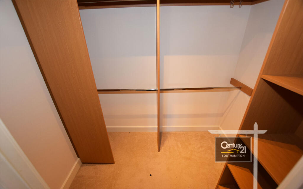 MASTER BEDROOM WALK IN WARDROBE
