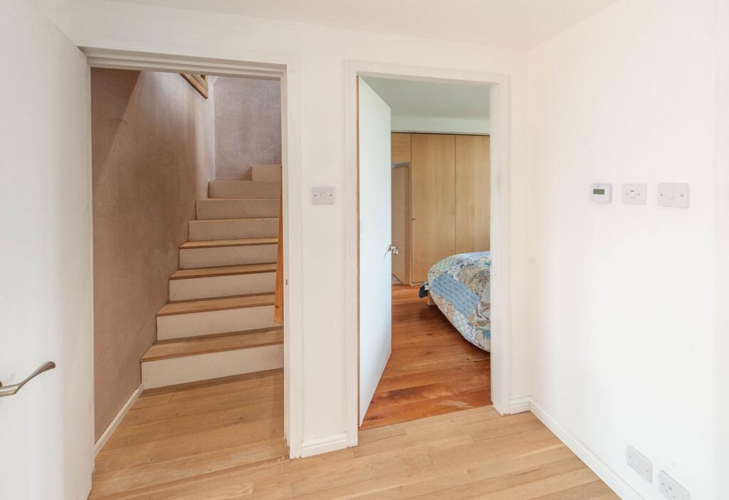 ENTRANCE HALLWAY AND LANDING