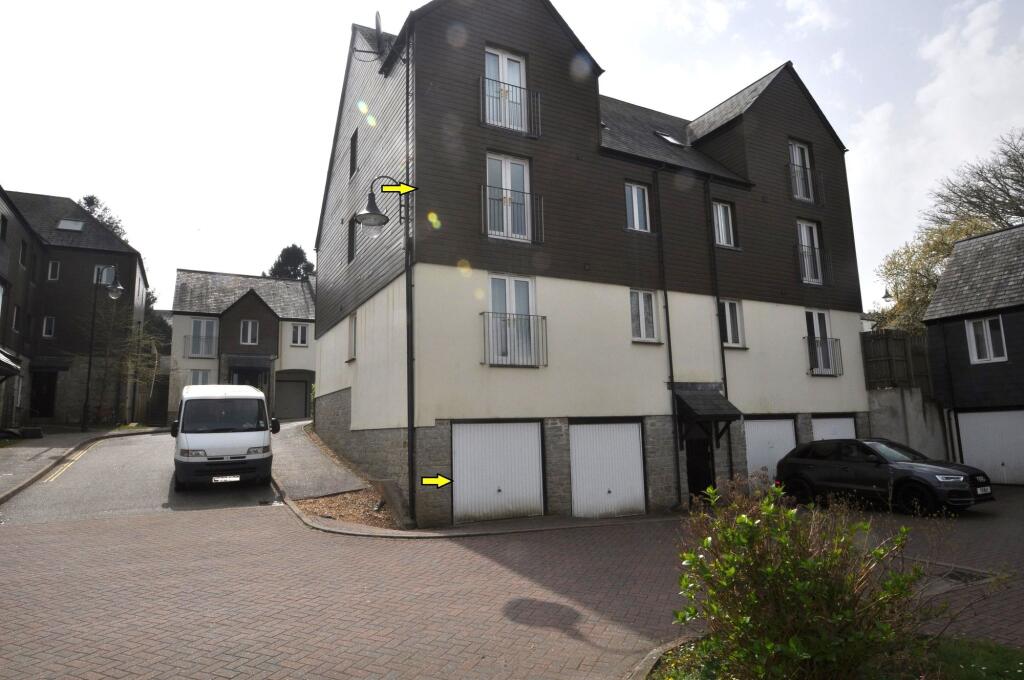 REAR SHOWING GARAGE