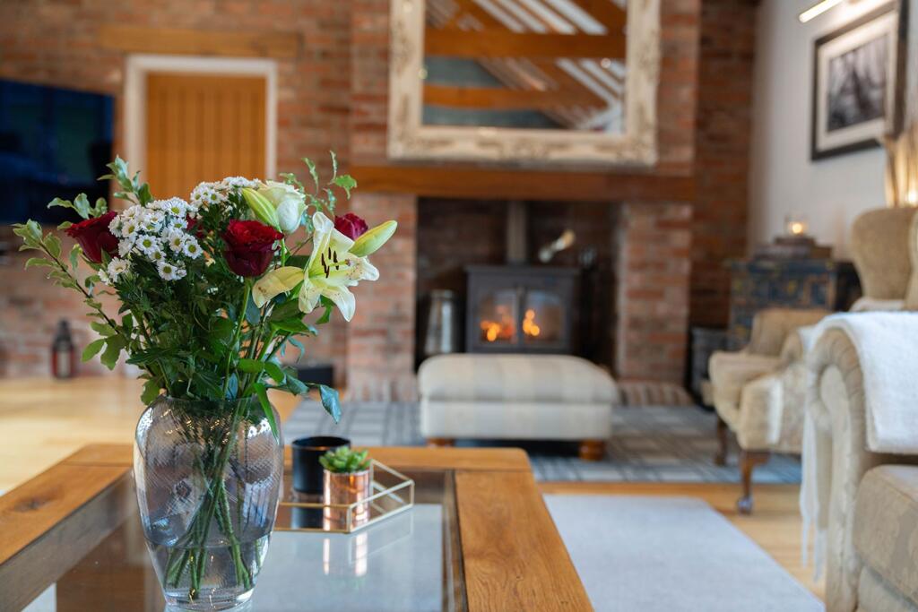 Enjoy the large log burner in the Sitting Room