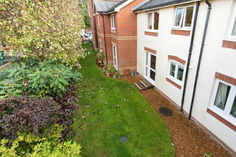 PHOTOS SHOW GENERAL VIEW OF DEVELOPMENT