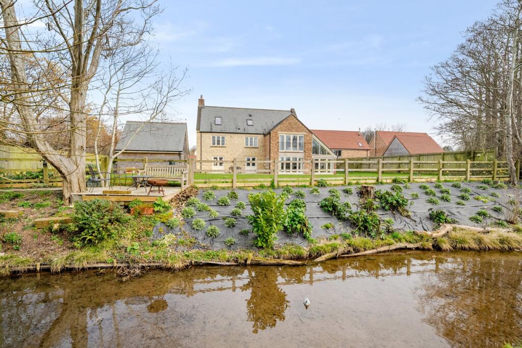 Freshwater pond towards the rear elevation