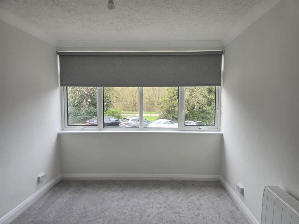 bedroom blind half down.jpg