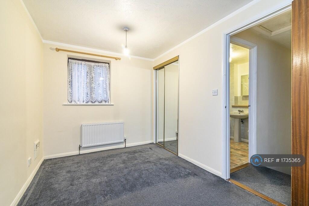 Bedroom With View Leading To Bathroom