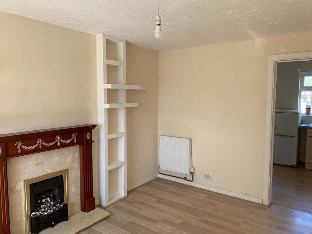 A bright and inviting living room with potentia...