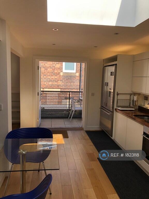 Double Doors Open To Balcony