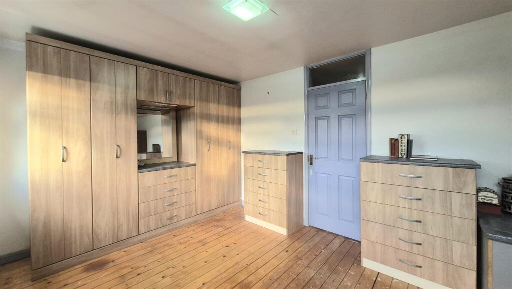 BEDROOM ONE 15'0 X 9'10