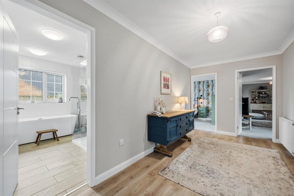 Inner Hallway towards Bedroom Three and Lounge.jpg