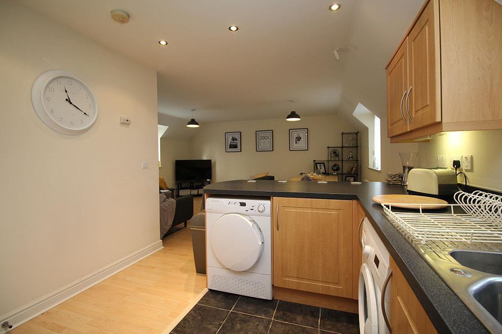 Kitchen through Livi