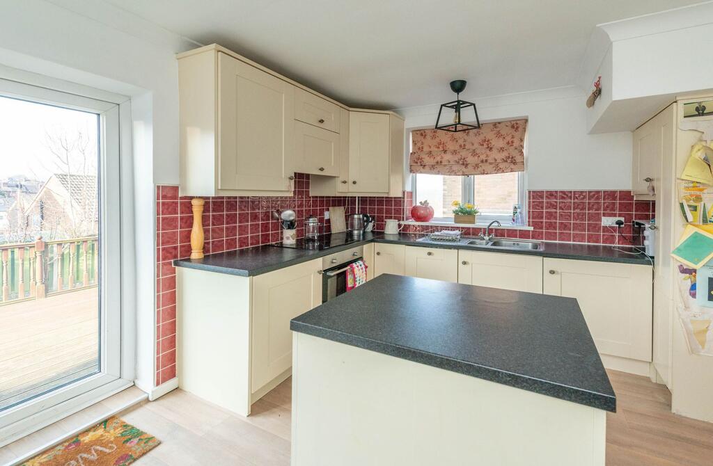 SITTING ROOM AND DINING KITCHEN