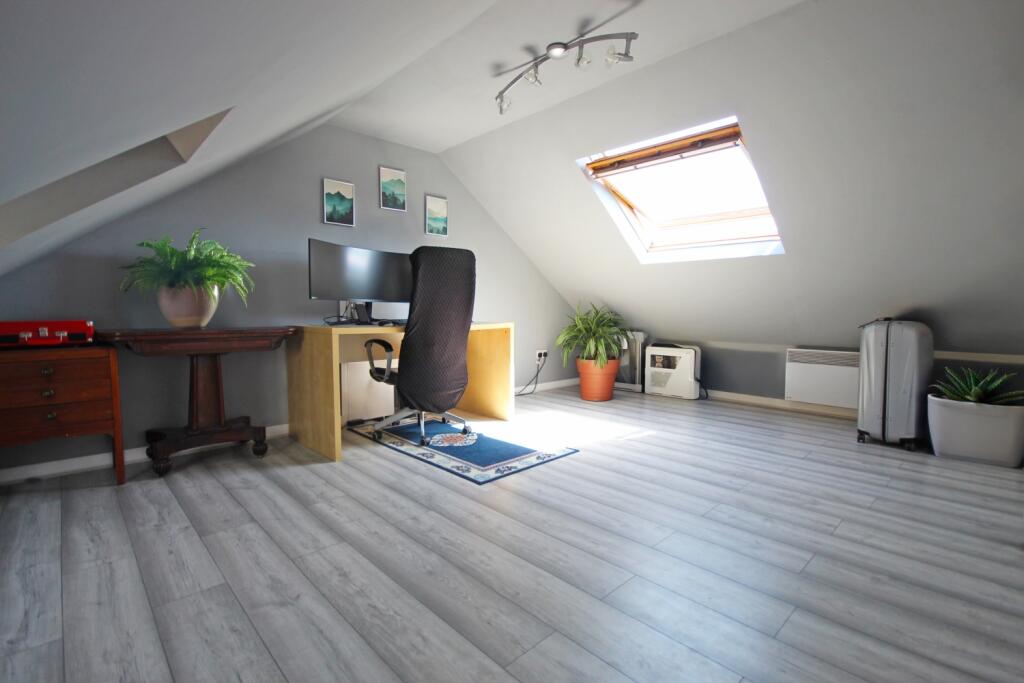 Bedroom 4 within the loft conversion with ample st