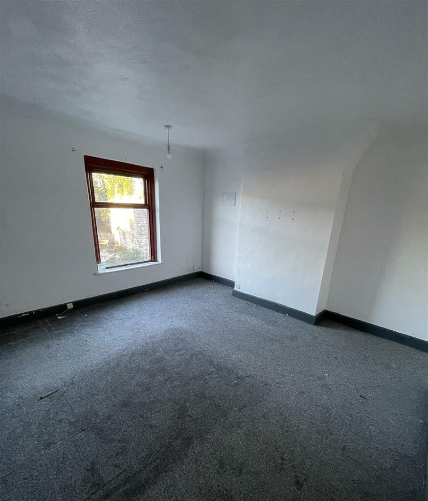 FRONT BEDROOM ONE