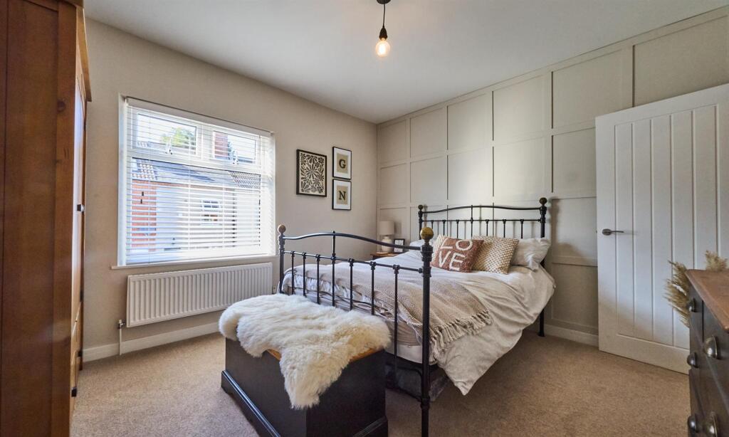 FRONT BEDROOM ONE