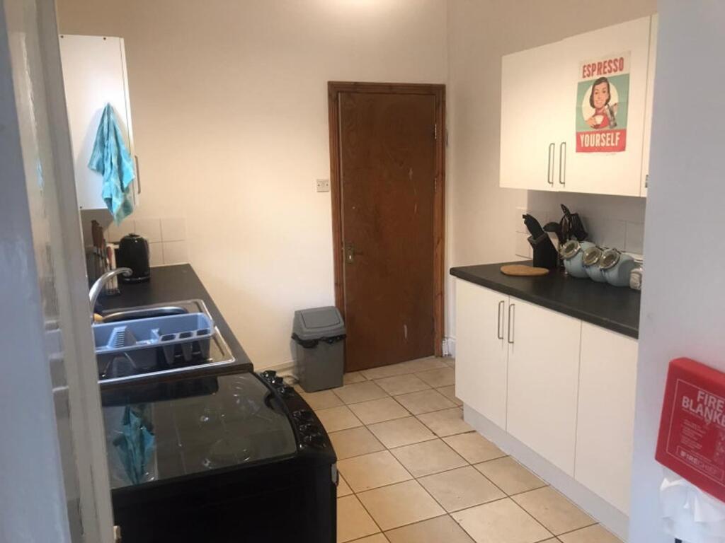 A tidy and functional kitchen space, perfect fo...